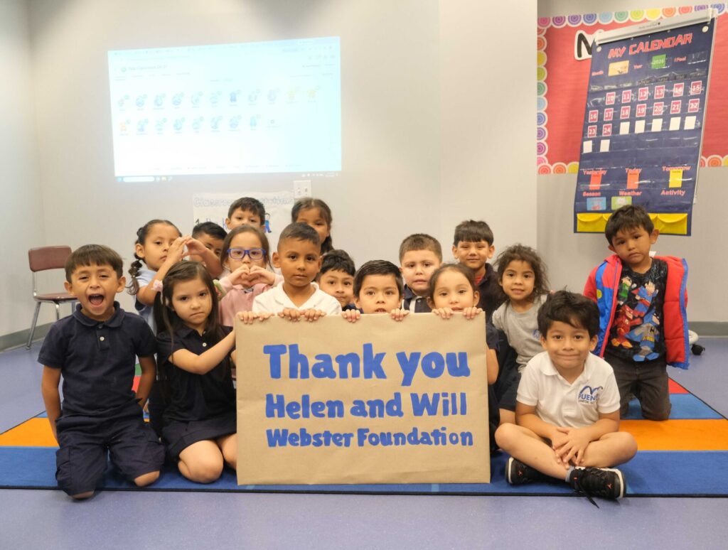 PUENTE Charter TK students holding thank you sign for the Helen and Will Webster foundation